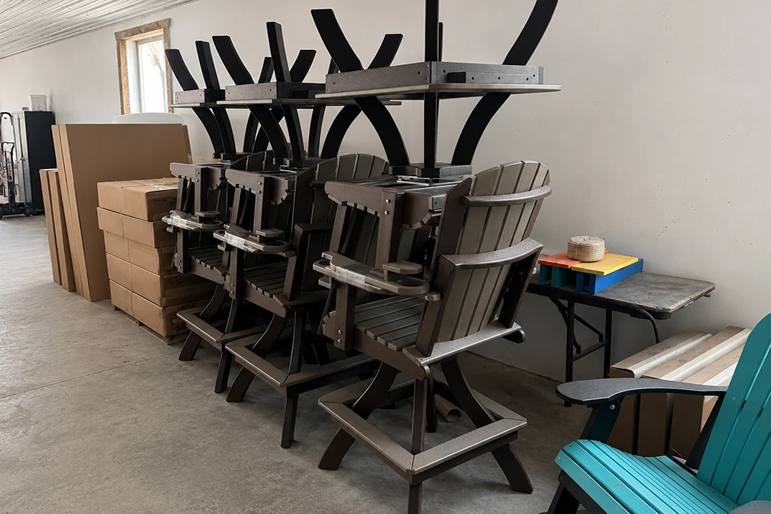 Stacked Kanyon Poly Furniture pieces ready for finishing and delivery